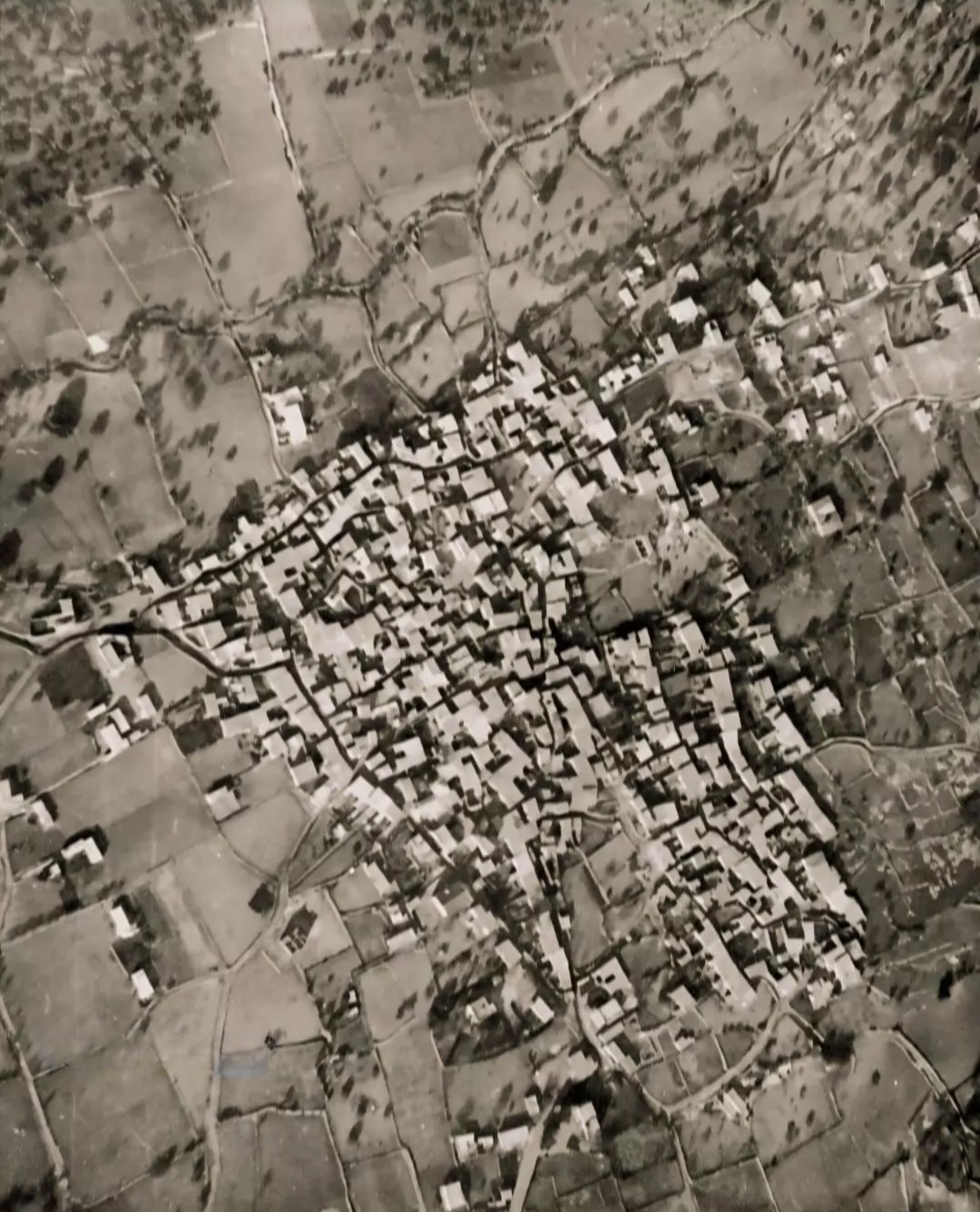 Historical aerial view of al-Bassa in black and white